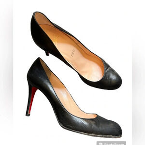 Louboutin Black Heels, size 39.5 fits like a 8 or 8.5. Reposhing are too small.